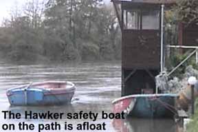 Hawker rescue boat floating over path