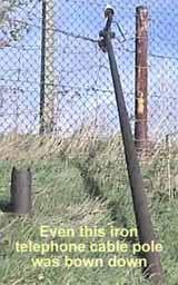 Broken telephone pole