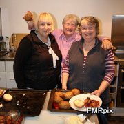 Photo by Frank Rainsborough of Diana, Helen and Di preparing lunch