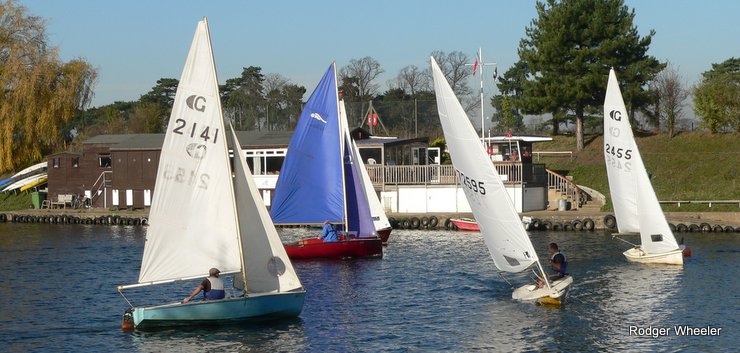 Boats sailing in front of the club