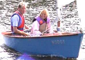 Laurie sailing with Debbie, a helper 